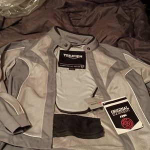 It is a brand new motorcycle jacket  the size is large, Gray